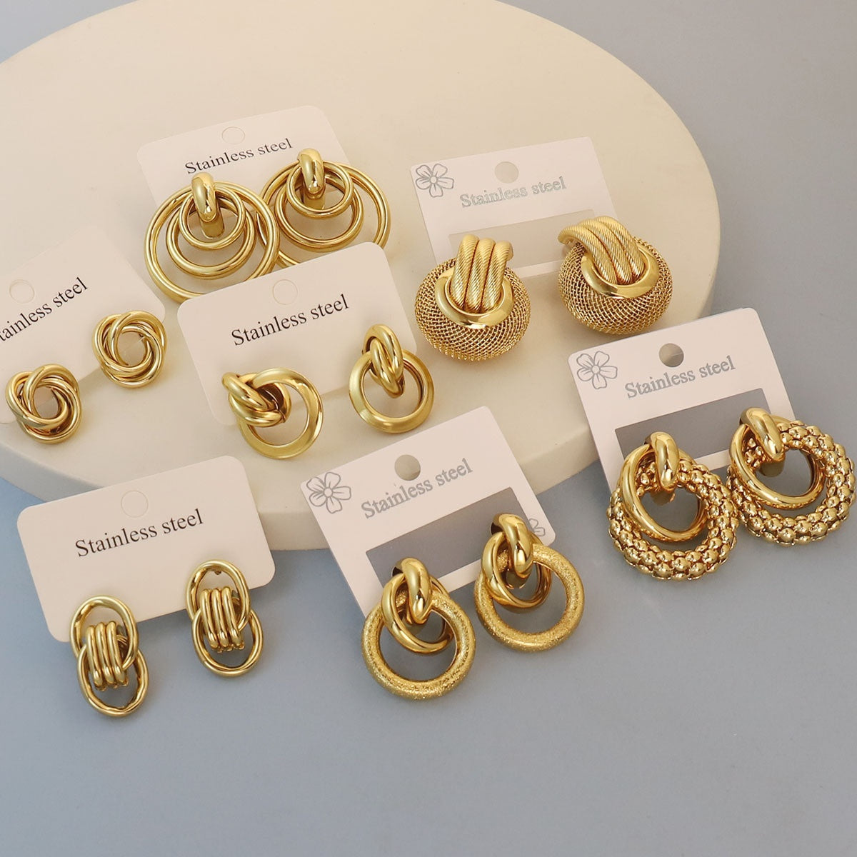 Golden Loop Luxe Collection Set of 7– Designer Knot & Circle Stainless Steel Earrings