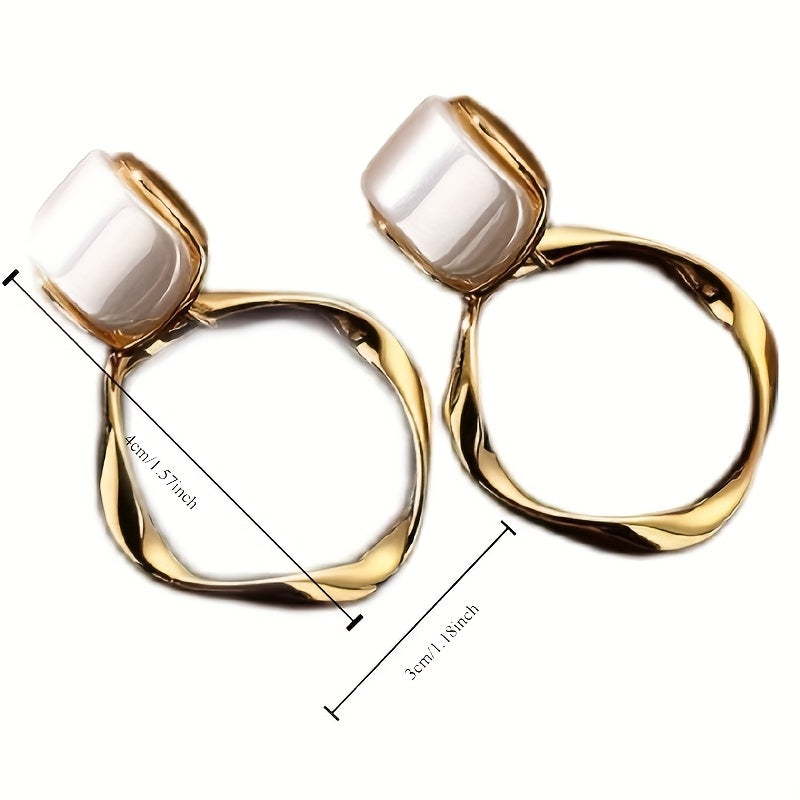 Golden Pearl Aura Earrings – Sculpted Elegance with Modern Twist