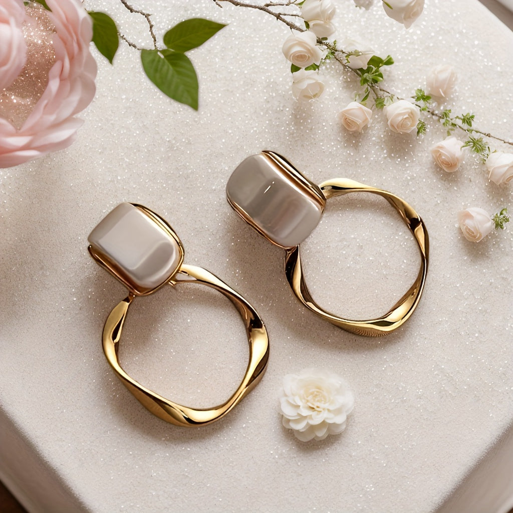 Golden Pearl Aura Earrings – Sculpted Elegance with Modern Twist