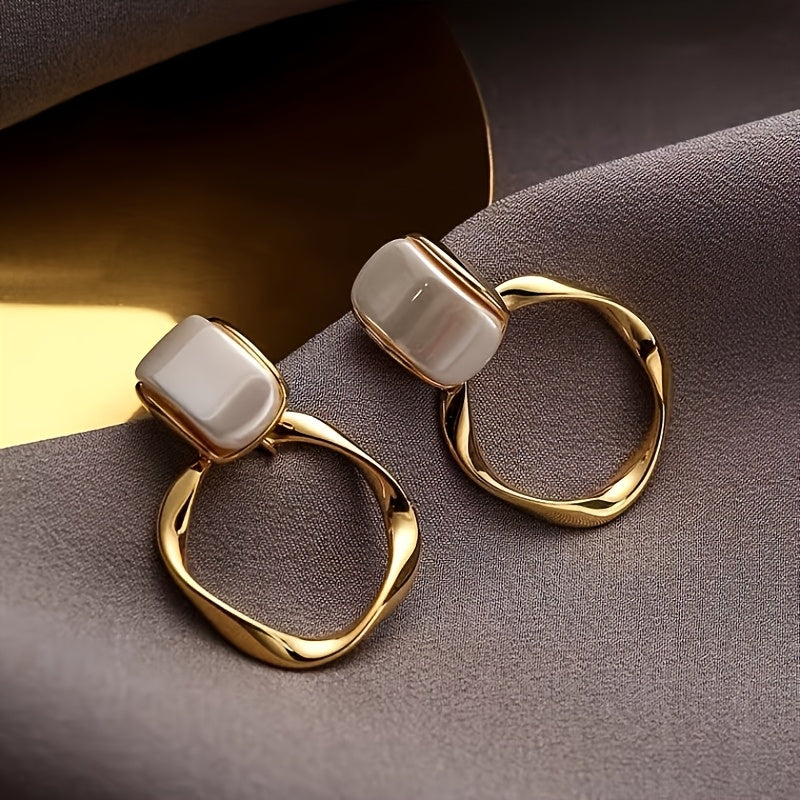 Golden Pearl Aura Earrings – Sculpted Elegance with Modern Twist